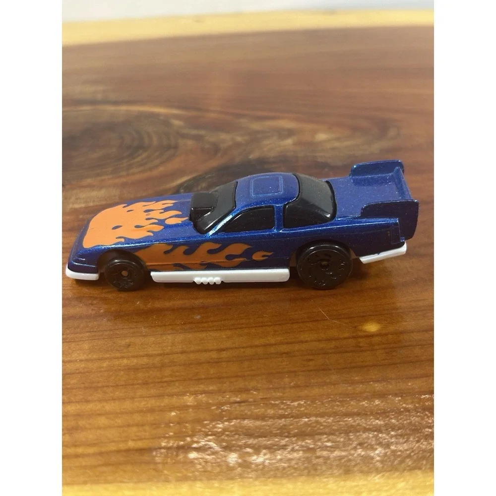 Hot Wheels 1993 MC 20 loose diecast racecar usually beat 20 cars